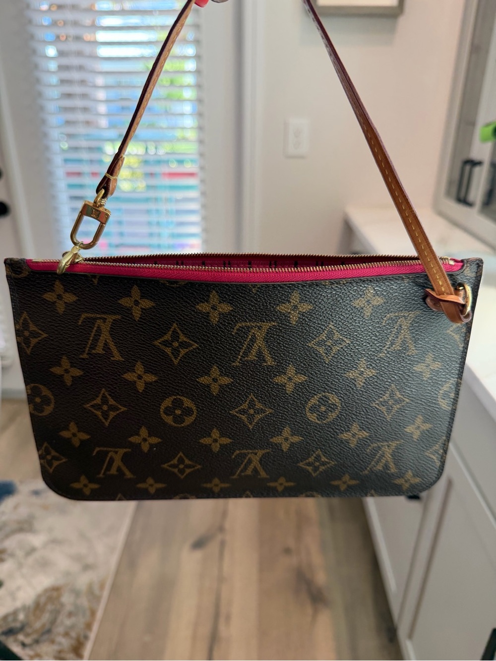 Authentic Louis Vuitton Monogram Neverfull Pouch with original straps